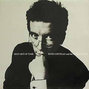 Elvis Costello And The Attractions* - Man Out Of Time (12", Single, Ltd)