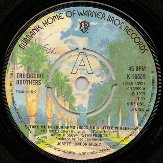 The Doobie Brothers - Take Me In Your Arms (Rock Me A Little While) (7", Single, Pus)