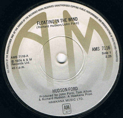 Hudson-Ford - Floating In The Wind (7", Single, Sol)